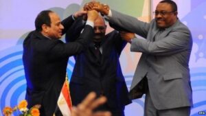 Egypt's leader (l) signed the deal, despite expressing reservations