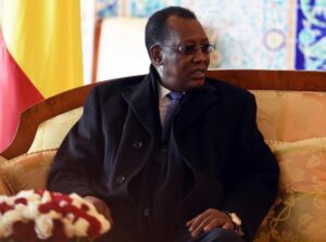 he President of Chad Idriss Deby Itno sits upon his arrival at Houari Boumediene Airport, outside Algiers, on December 27, 2014 (AFP Photo/Farouk Batiche) 