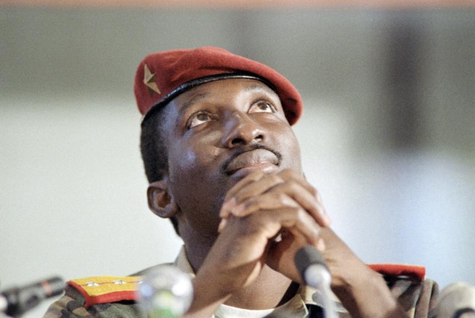 Captain Thomas Sankara, then President of Burkina Faso, sits during a press conference in Harare, Zimbabwe, on September 2, 1986 (AFP Photo/Dominique Faget)