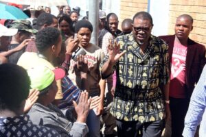 File photo shows then vice president of Namibia's ruling South West Africa People Organization (SWAPO) Hage Geingob (2R) after voting in Windhoek on November 28, 2014 (AFP Photo/Jordaania Andima) 