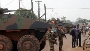 French soldiers stand near armoured personnel carriers on March 13, 2015 in Bangui, Central African Republic (AFP Photo/Pacome Pabandji)