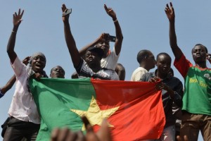 People celebrate in Ouagadougou on October 31, 2014 after Burkinese President Blaise Compaore announced that he was stepping down (AFP Photo/Issouf Sanogo) 