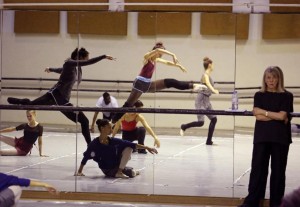 South African choreographer Veronica Paeper, right, watches dancers rehearse for the show "A Spartacus in Africa" in Cape Town, South Africa, Thursday, April 2, 2015. A new South African production of the ballet, "A Spartacus in Africa," will incorporate African dance styles with classical and contemporary dance for a story that its producers say resonates on a continent with its own history of oppression. (AP Photo/Schalk van Zuydam)