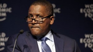 Aliko Dangote, billionaire and chief executive officer of Dangote Group, pauses during a session at the World Economic Forum in Davos, Switzerland, on Jan. 22, 2015. Photographer: Jason Alden/Bloomberg