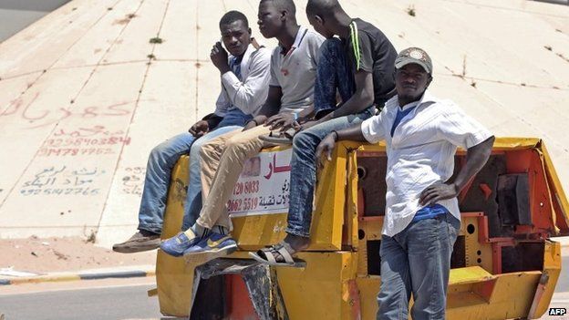 Migrants in Tripoli gather at points where contractors come to offer them jobs