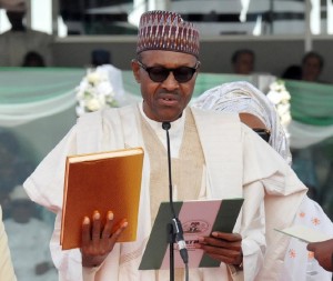 Nigerian President Mohammadu Buhari takes an oath during his inauguration at the Eagles Square in Abuja, on May 29, 2015 (AFP Photo/)