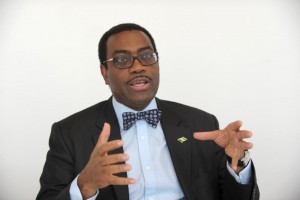Nigerian Agriculture Minister and candidate for next president of the African Development Bank, Akinwumi Adesina, talks to the media in Paris on March 25, 2015 (AFP Photo/Eric Piermont)