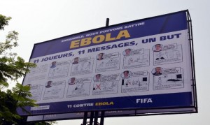 A board bearing the "11 against Ebola", a joint campaign between FIFA, the CAF and health experts, to raise awareness in the fight against Ebola on December 17, 2014 (AFP Photo/Zoom Dosso)