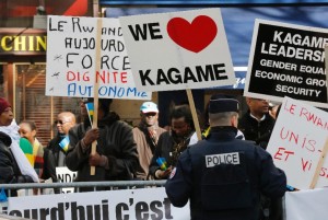 Supporters of Rwandan President Paul Kagame gather during a rally near the offices of UNESCO in Paris on February 27, 2015, where the president was attending a meeting (AFP Photo/Francois Guillot)