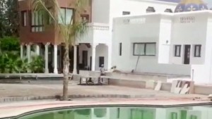 The video showed workmen sweeping up by the pool
