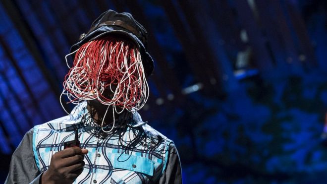 Investigative reporter Anas Aremeyaw Anas remains incognito by covering his face in public