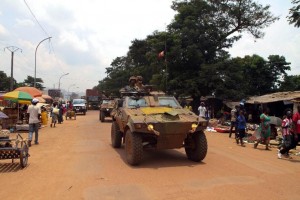 A convoy of French Operation Sangaris vehicles drives through Bangui's Combattant district on September 14, 2015. AFP PHOTO / EDOUARD DROPSY (AFP Photo/Edouard Dropsy)