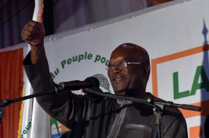 Roch Marc Christian Kabore waves to supporters at party headquarters in Ouagadougou on December 1, 2015 after winning Burkina Faso's presidential election (AFP Photo/Issouf Sanogo)
