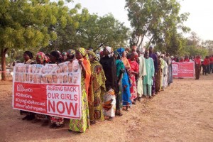 Members of the "Bring Back Our Girls" movement and mothers of the missing schoolgirls march on January 14, 2016 in Abuja (AFP Photo/)