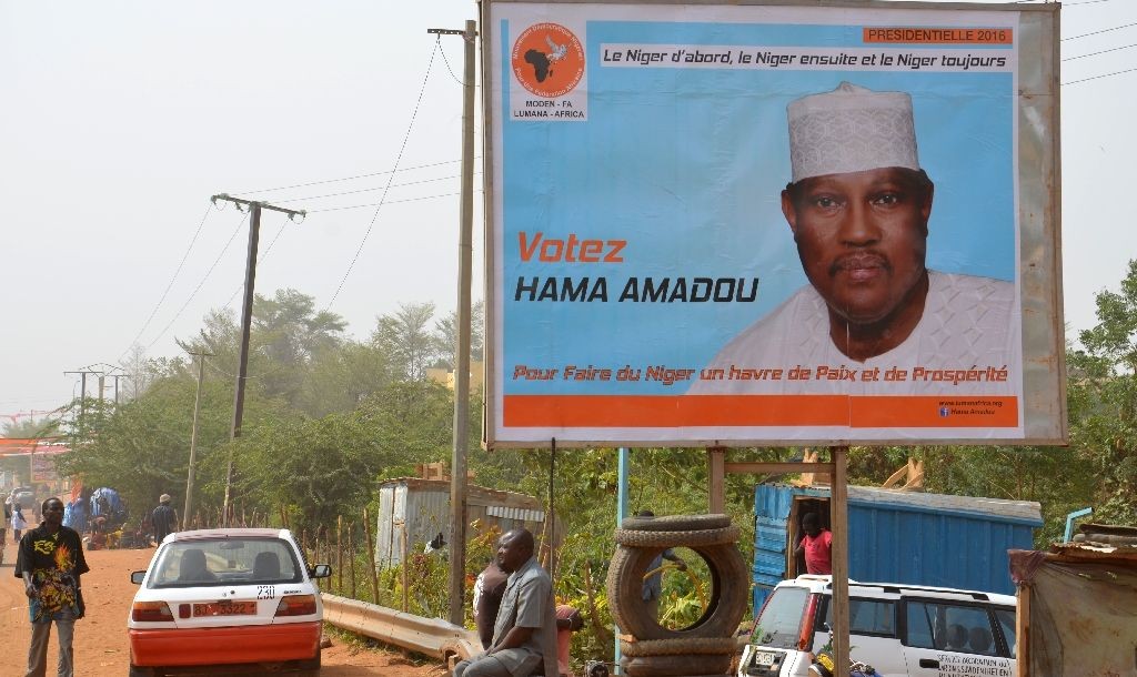 A campaign poster depicting Niger's leading opposition figure and contender Hama Amadou, jailed since November 2015 over his alleged involvement in a baby-trafficking scandal, on February 2, 2016 A campaign poster depicting Niger's leading opposition figure and contender Hama Amadou, jailed since November 2015 over his alleged involvement in a baby-trafficking scandal, on February 2, 2016 (AFP Photo/Boureima Hama)