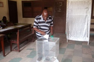 A man cast his ballot at a polling station, in Brazzaville, Congo. Republic of Congo's president, who has ruled the Central African country for more than 30 years, March 20, 2016.