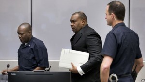 Jean-Pierre Bemba enters the courtroom of the International Criminal Court in The Hague, Netherlands, March 21, 2016. The court's judges handed him a guilty verdict.