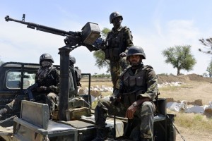 Cameroonian soldiers patrol in Amchide, near the Nigerian border, in November. PHOTO: AGENCE FRANCE-PRESSE/GETTY IMAGES