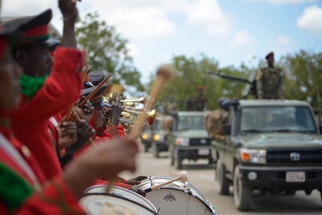 A military band plays during a parade at the Somali Armed Forces Headquarters to celebrate the army’s 56th anniversary in Mogadishu. Credit: AMISOM/Tobin Jones