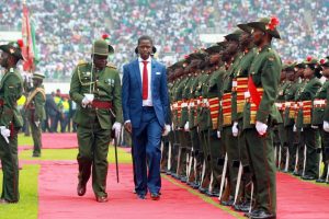 Zambia's President Edgar Lungu (C) receives a guard of honor after being sworn in at a stadium in Lusaka, Zambia, January 25, 2015. Lungu has received the backing of 13 opposition parties ahead of August's elections. SALIM DAWOOD/AFP/GETTY IMAGES