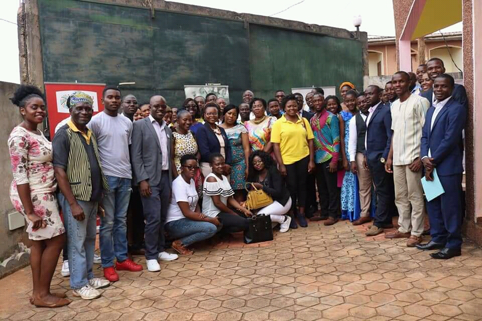 Officials of the Denis and Lenora Foretia Foundation and participants at the end of the seminar on Community involvement in promoting peace in Cameroon