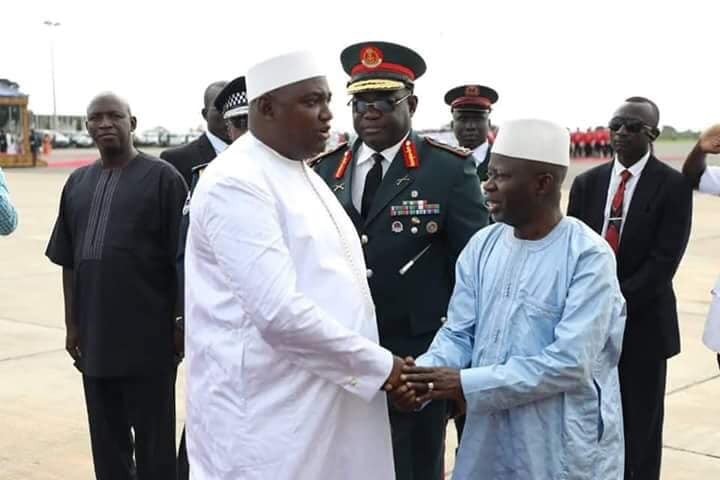 Adama Barrow shakes hands with Ousainou Darboe who was sacked as his deputy. Photo: Facebook/ Omar Wally