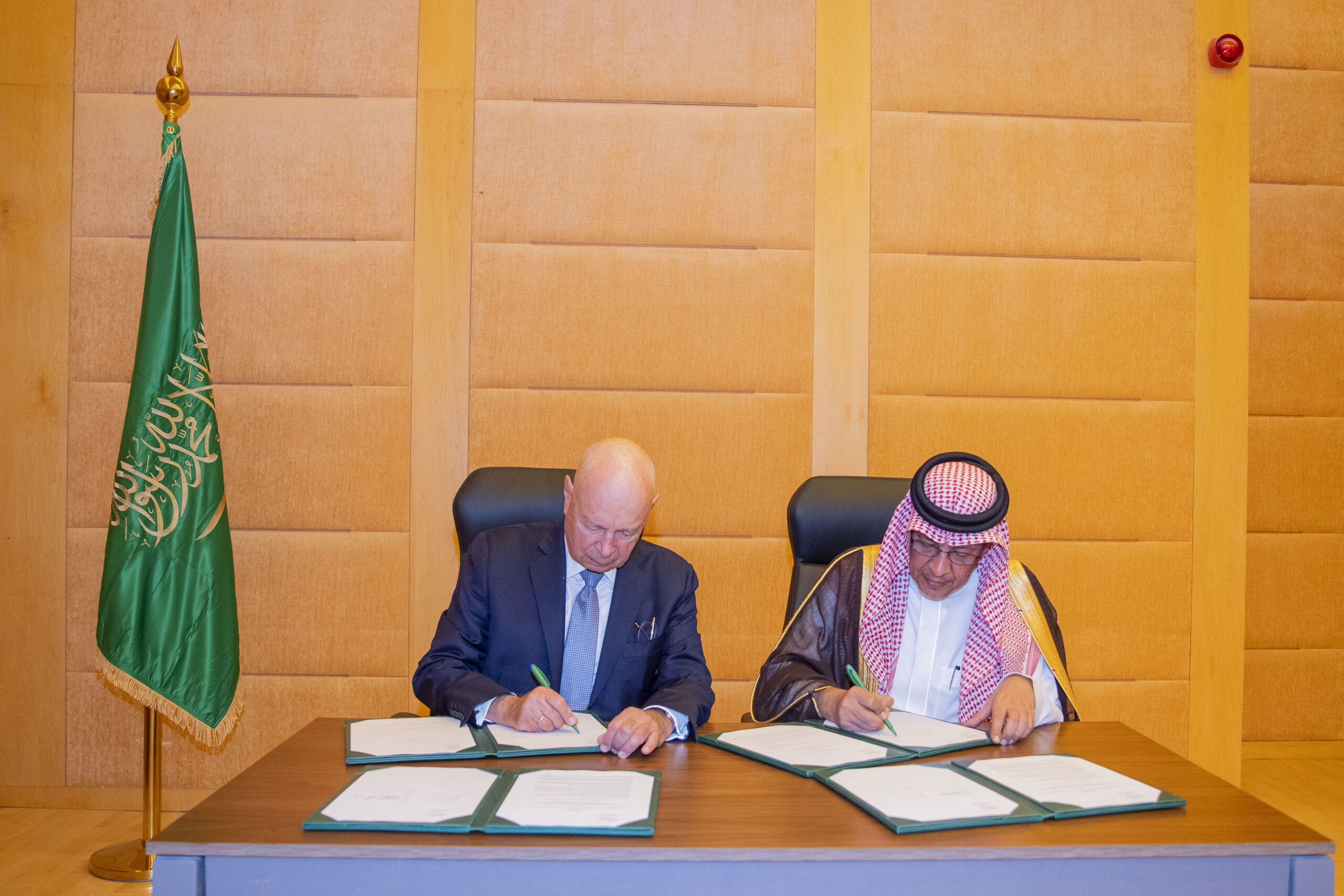H.E. Mohammed Al-Tuwaijri, Minister of Economy and Planning, and Professor Klaus Schwab, Founder and Executive Chairman of WEF sign agreement in Riyadh Nov 6, 2019