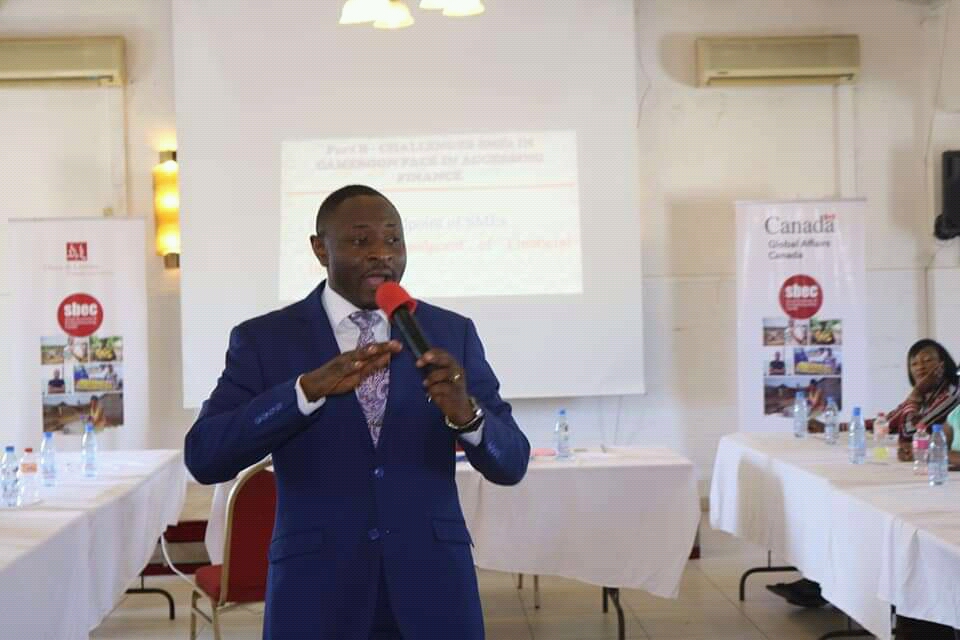 Tatoh Kenneth Ndi, a seasoned Finance Manager speaking to entrepreneurs at the SBEC training in Douala