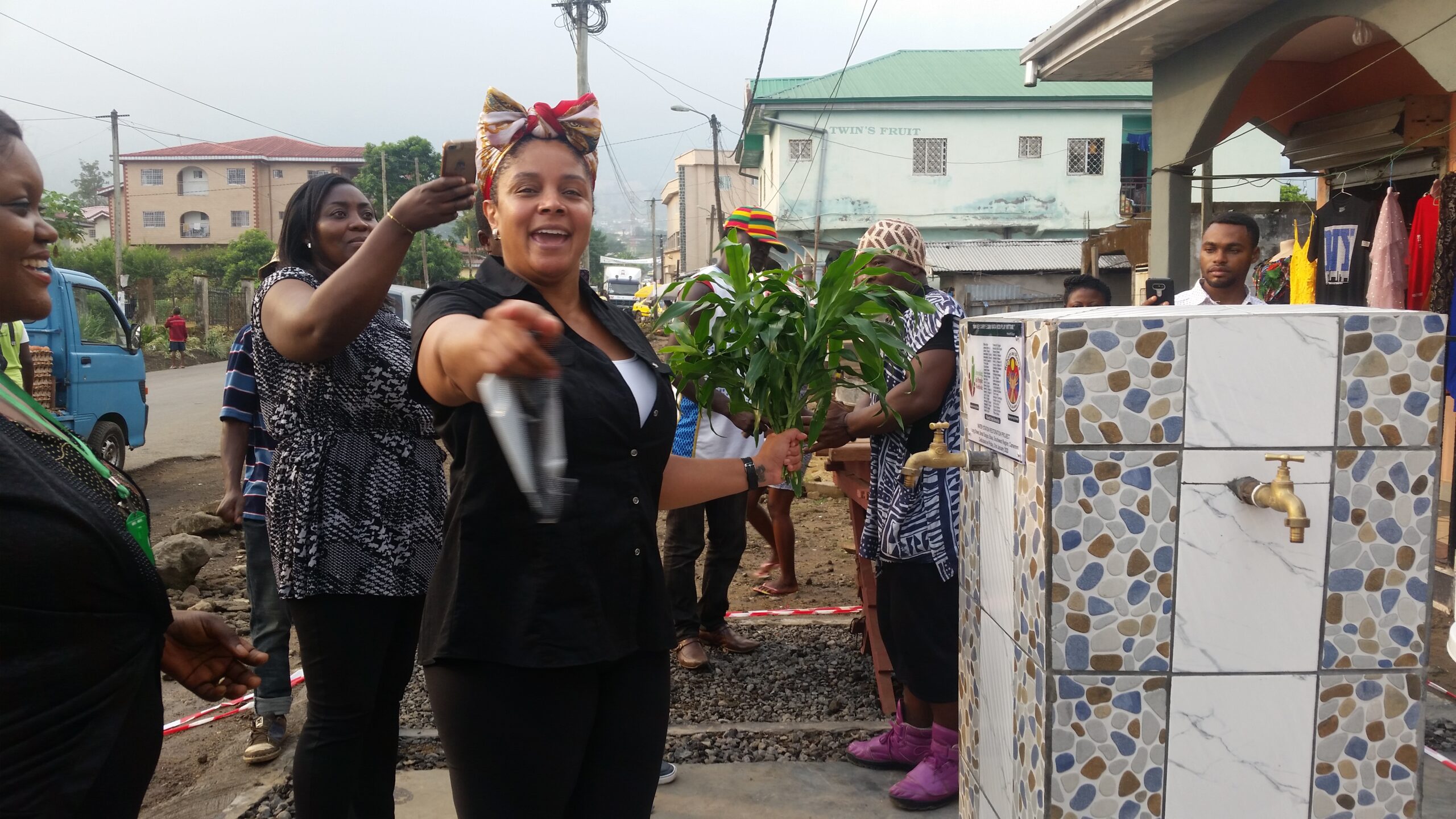 Mrs Renėe Duguė from Reborn and Rising (USA) Commissions the Water Station Restoration Project as Ruth Bisong, IPW Director looks on