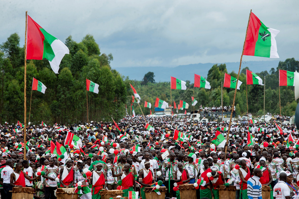 Supporters of Burundi’s ruling CNDD-FDD party attend a campaign rally in Gitega province on 27 April (Reuters)