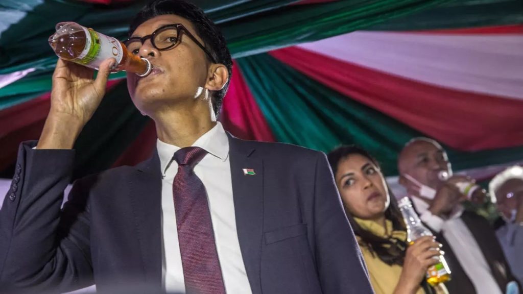 Madagascar's President Andry Rajoelina sips Covid Organics, RIJASOLO AFP/File